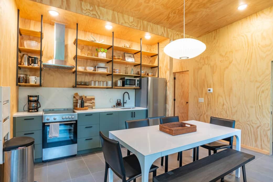 Sleek, modern dining with a Nelson saucer light and seating for 6. Enjoy Scandinavian-inspired design in this functional space for meals and conversation.