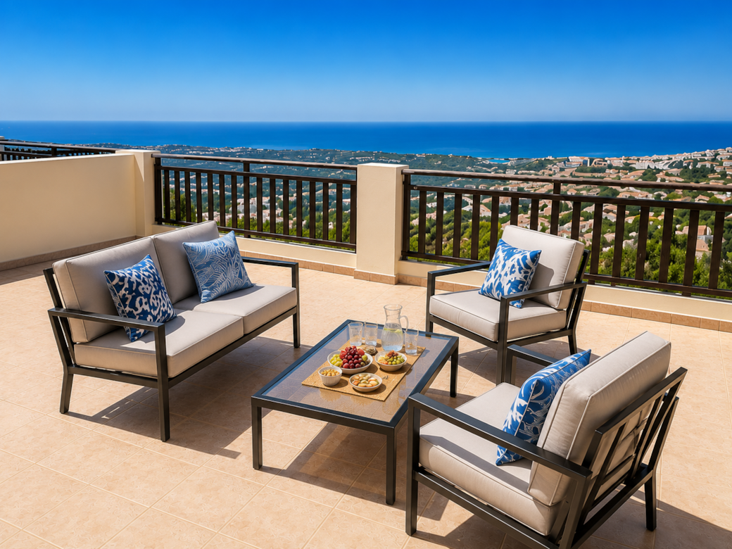 Expansive balcony with panoramic sea and village views