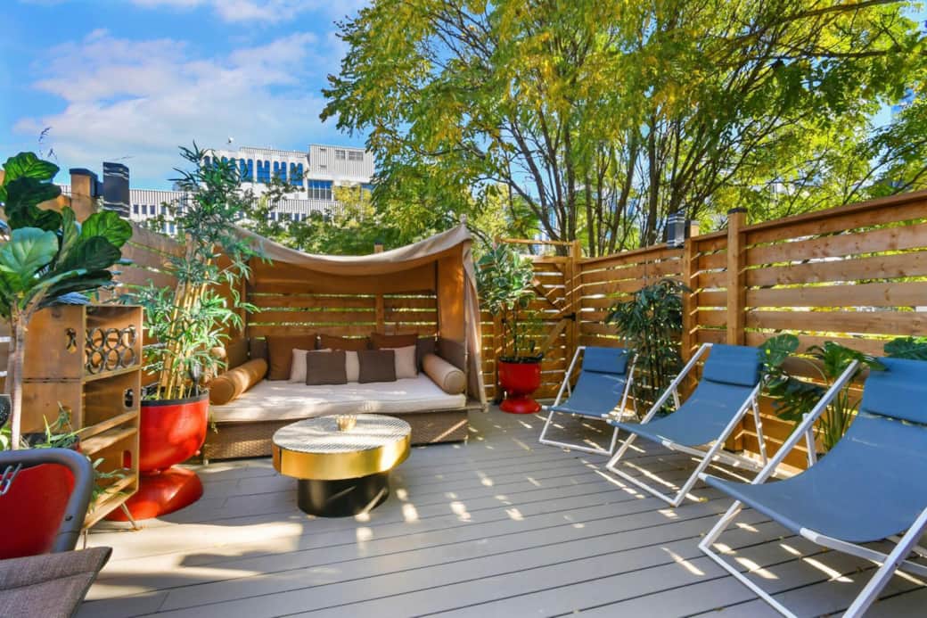 rooftop terrace sitting area + longchairs