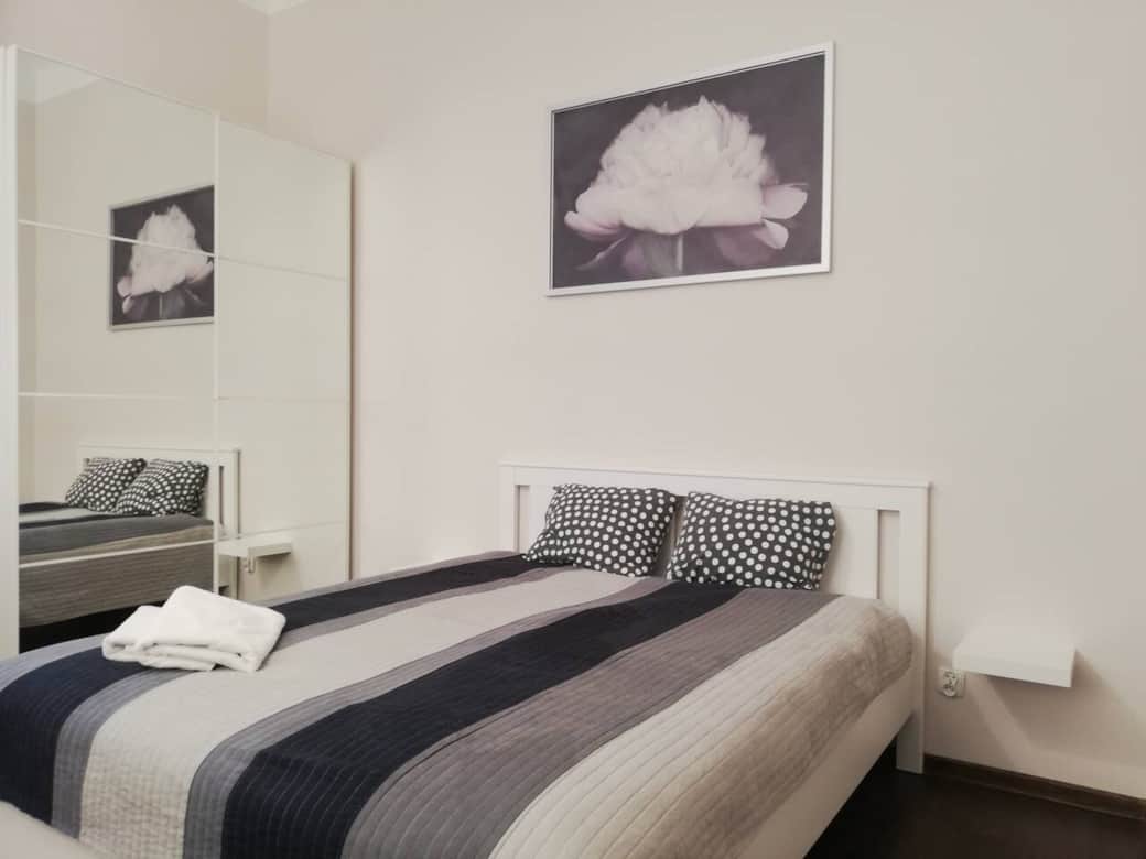 Full sized bed and big wardrobe with mirror. Full sized bed and big wardrobe with mirror.