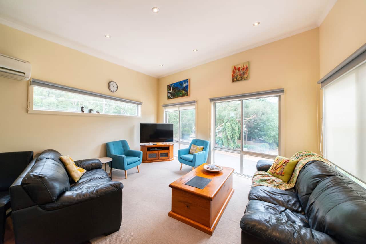 Air-conditioned retreat: Upstairs TV lounge, perfect for cozy relaxation.