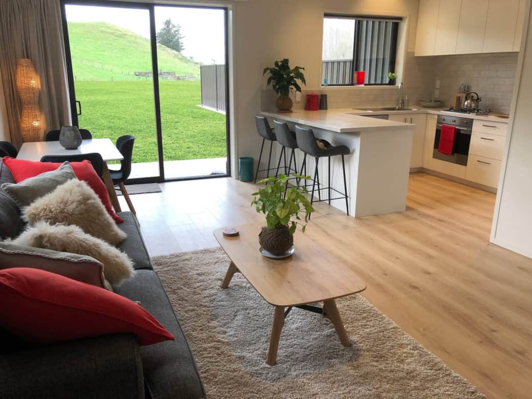 Your home away from home... enjoy a cup of tea or glass of wine while the kids play outside .. 
check out the stars at night.. with no light pollution and just the moreporks to lull you to sleep!