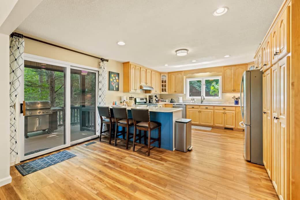 Well Equiped Kitchen with Sliding Door Access to Grill Area Well Equiped Kitchen with Sliding Door Access to Grill Area