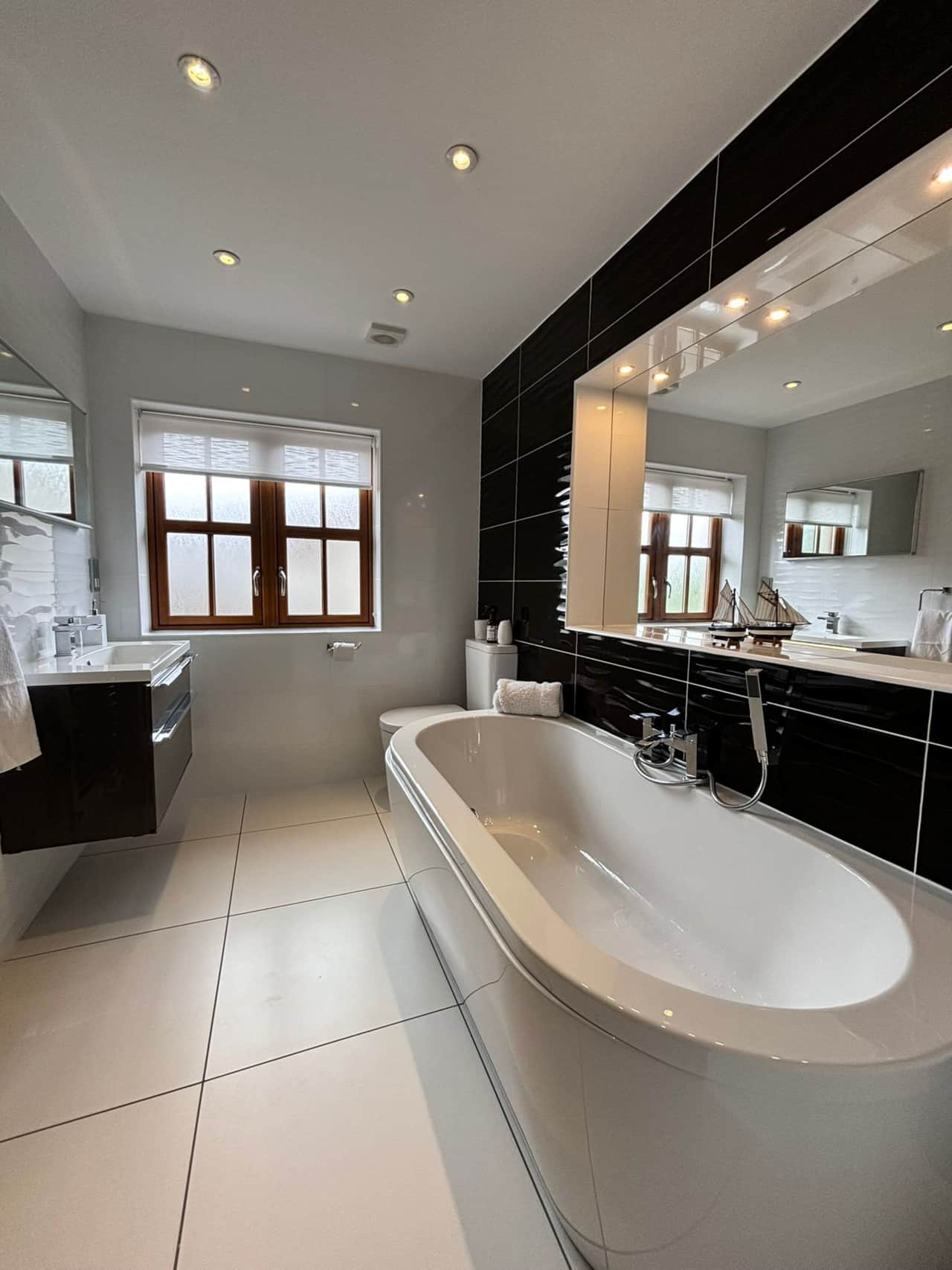 Luxurious bathroom with sleek design, ideal for a relaxing soak.