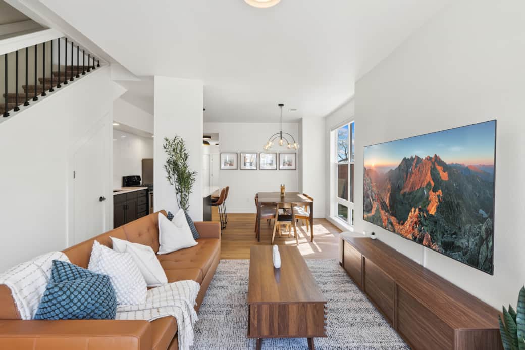 Open concept living room and dining room with lots of bright and airy Windows!