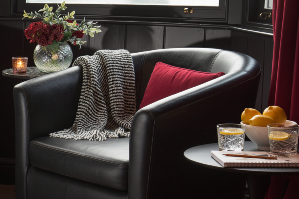 Queen of Hearts lounge: Dramatic red decor, cosy seating for games (chess), plus TV with Netflix