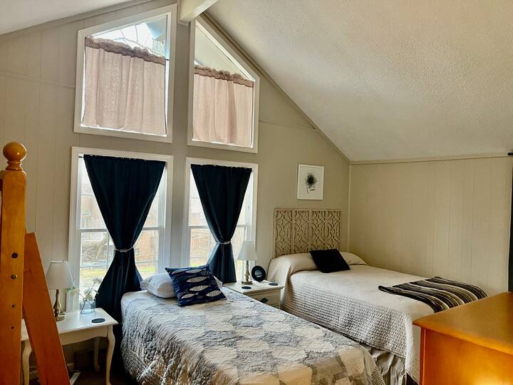 Enough beds for a big family to stay together in this upstairs room.