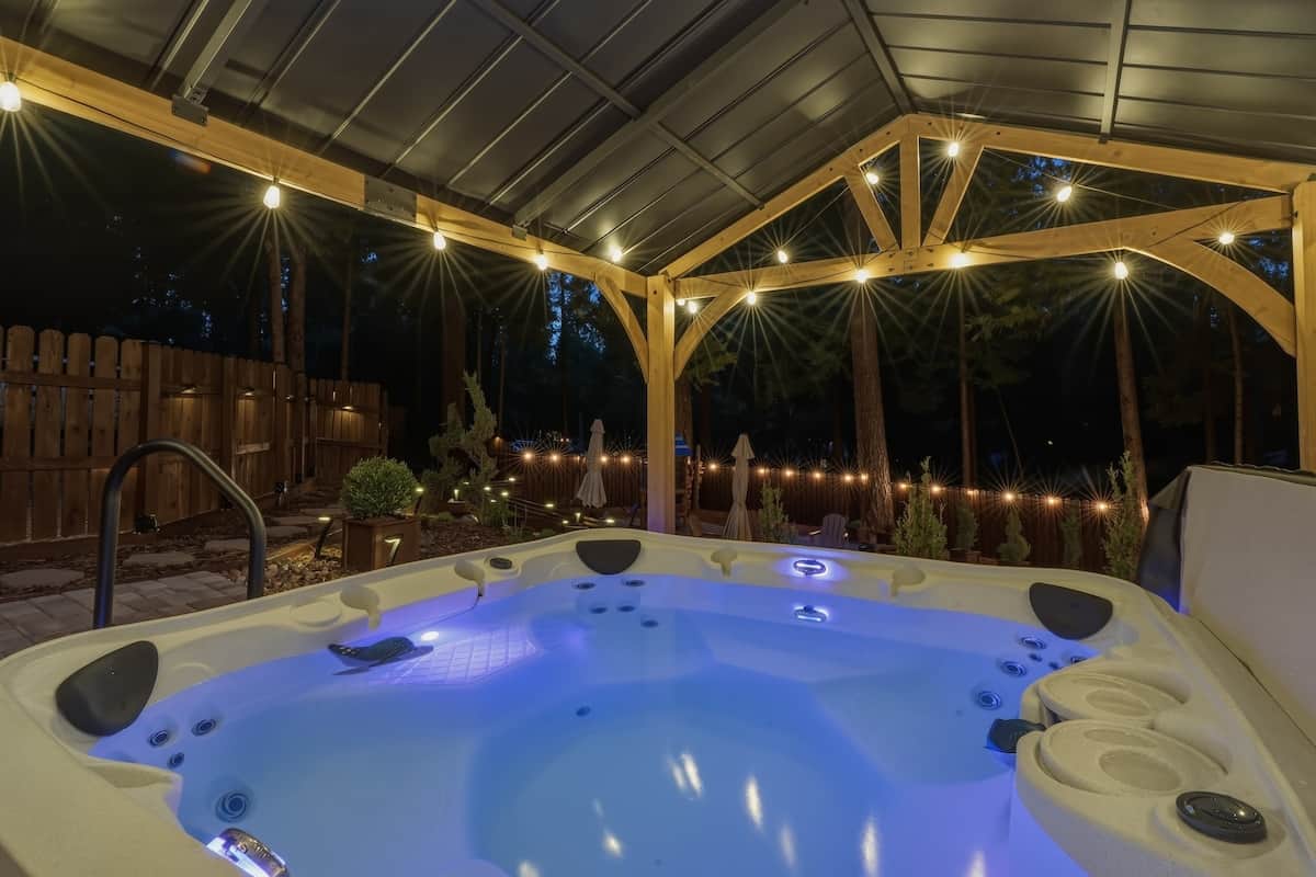Hot Tub — Evening soak beneath the gazebo