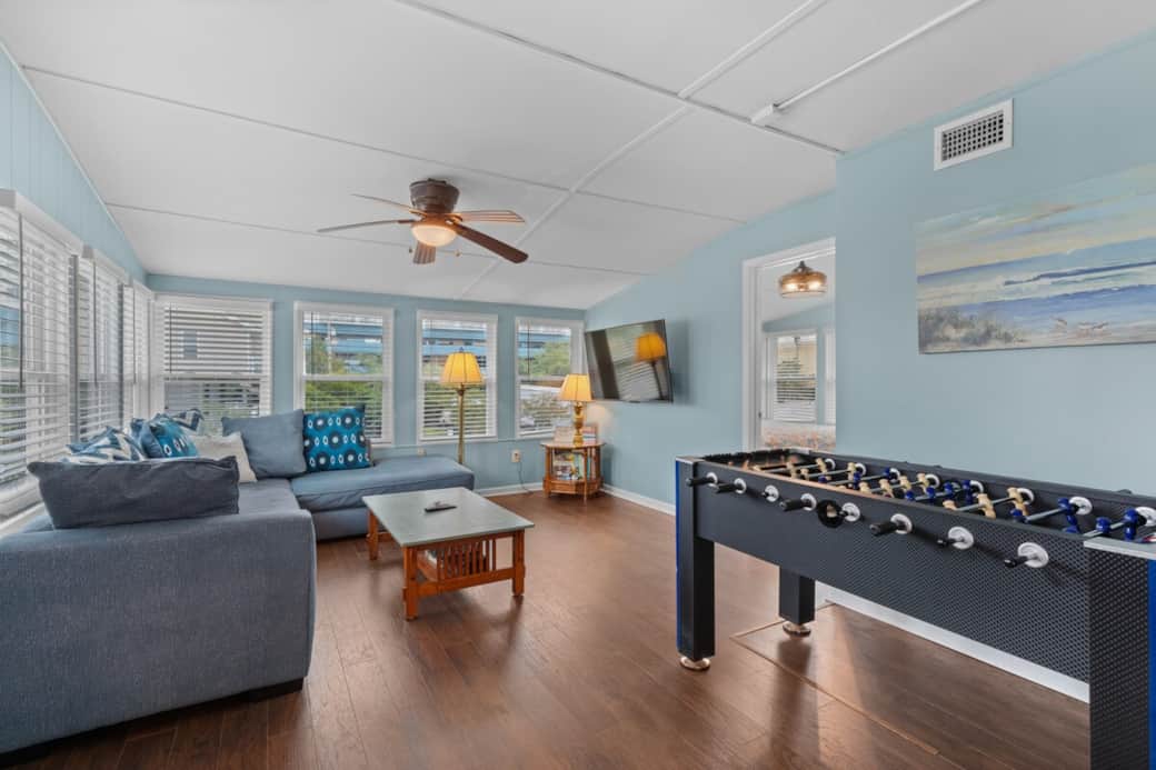 Bright Family Room offers lots of comfortable seating with a large Smart TV, Foos Ball and Pac Man Machines for family fun.  Plus board games & puzzles for guest use.