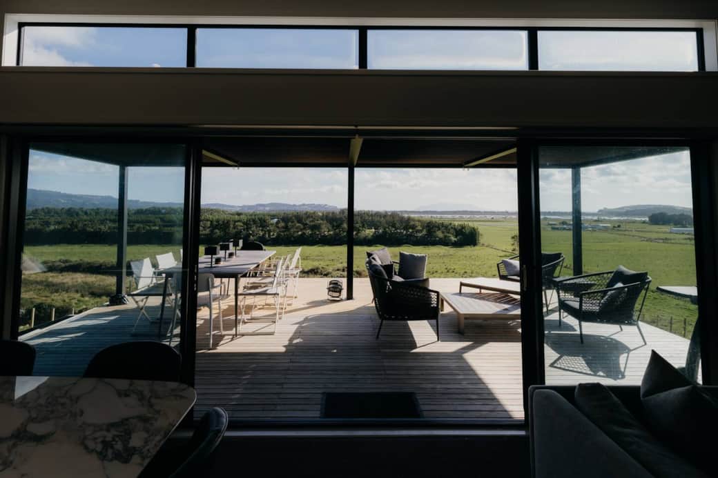 Desk overlooking the farm and Little Barrier in the distance