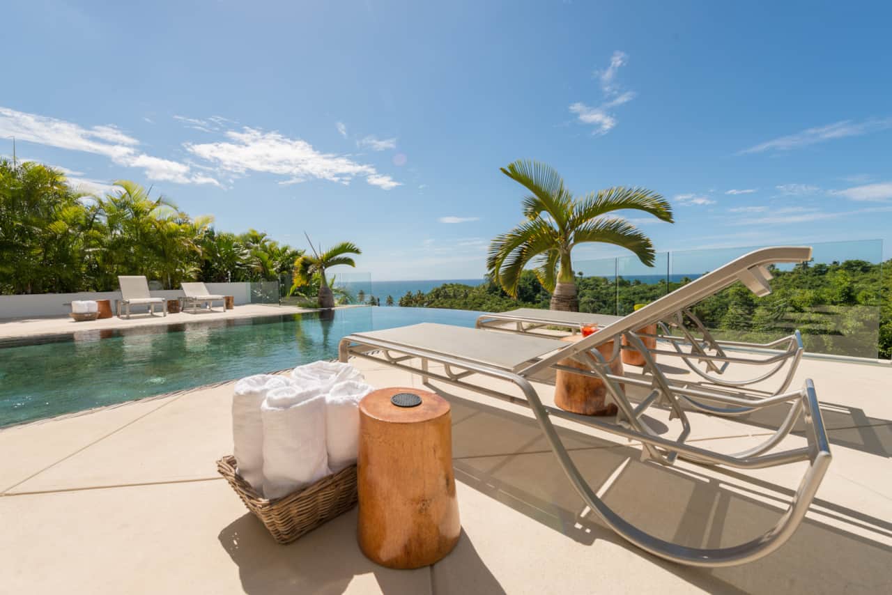 Lounge chairs and pool towels at Casa Phil luxury villa in Las Terrenas