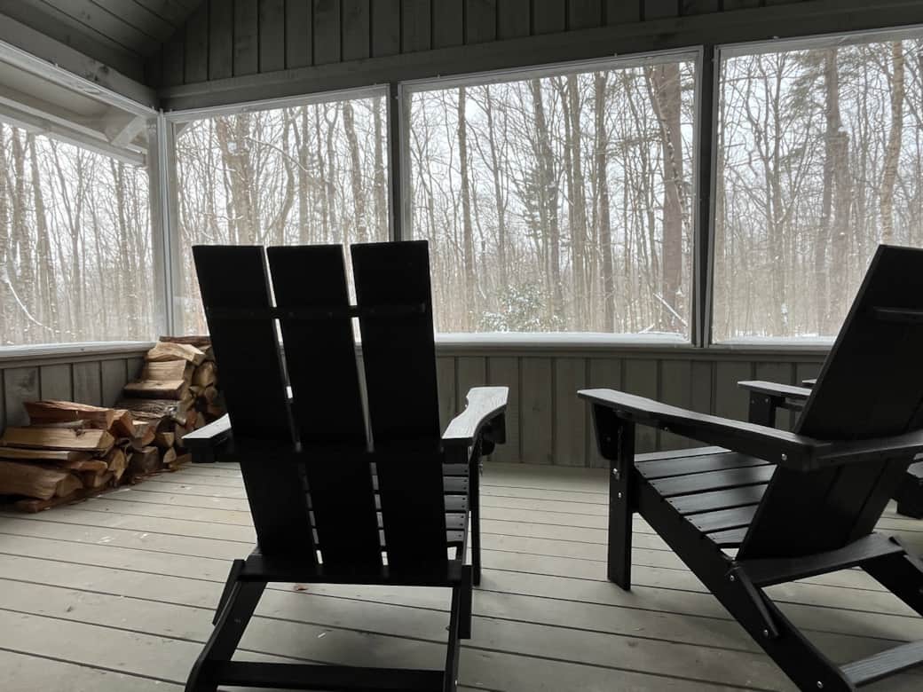 Sit and overlook the woods and sunsets from the 3-season porch.