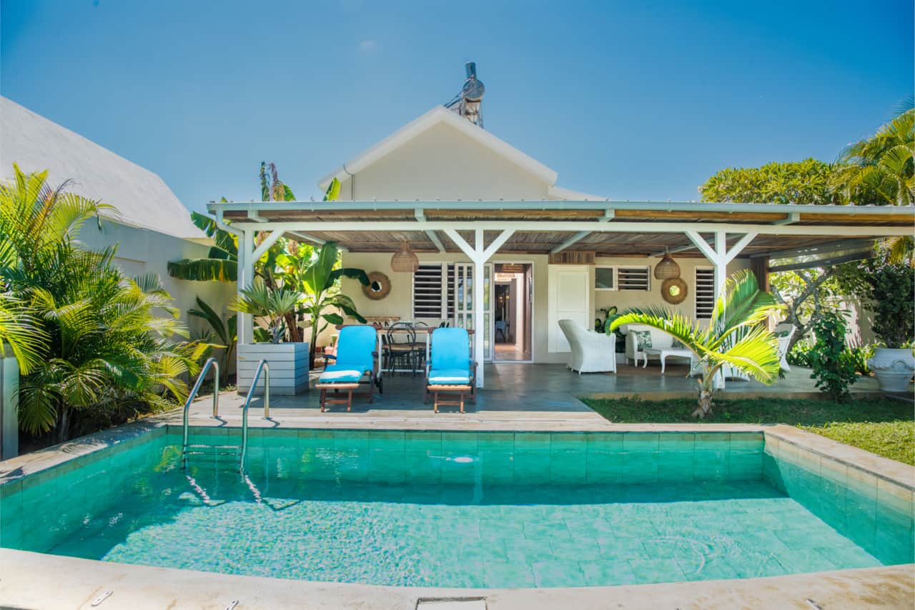 View of the villa and pool from the garden