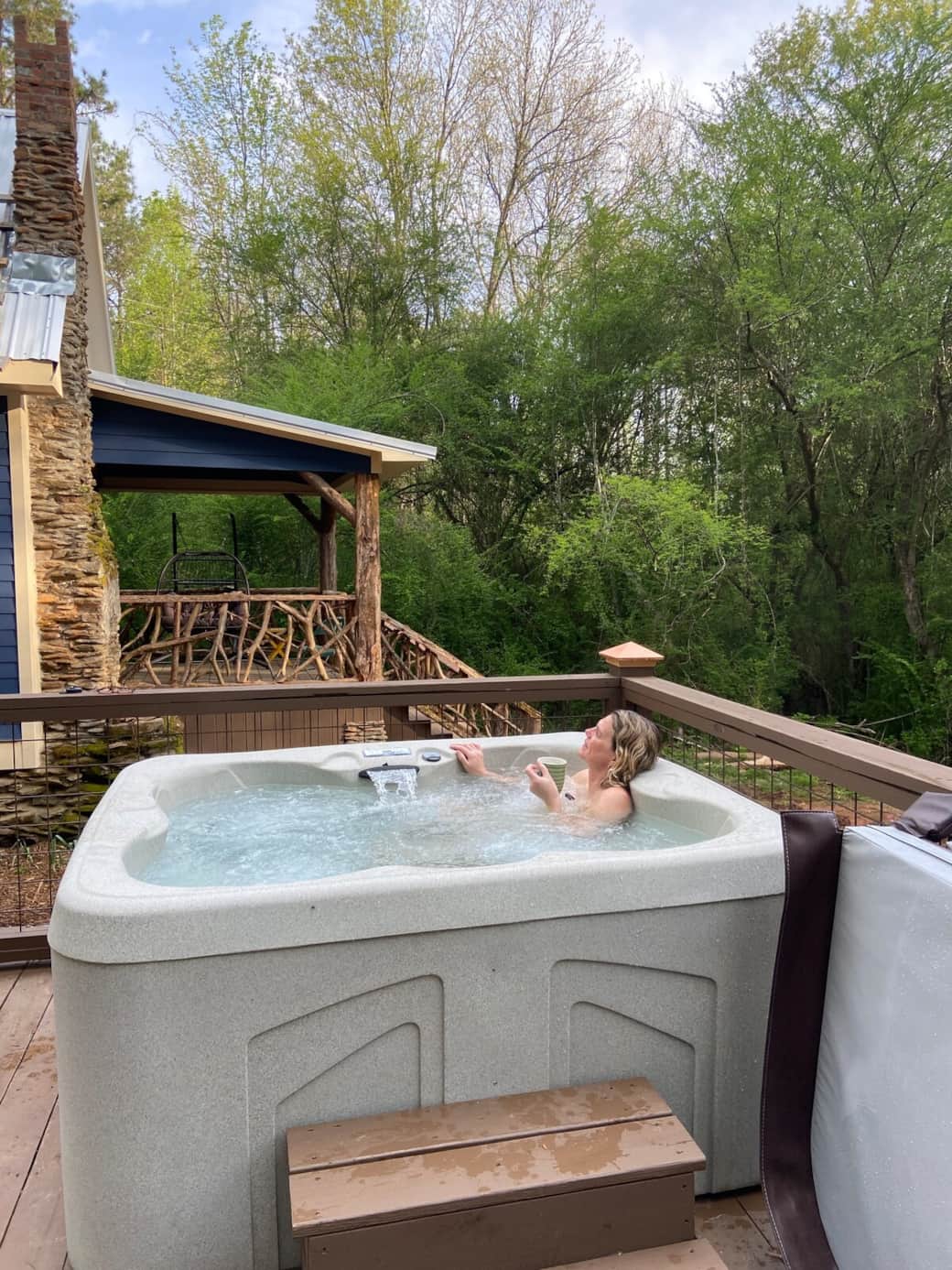 Soak in the 4 seater hot tub while banking up a nice fire in the chimney with your beverage of choice.  It's great all 4 seasons.