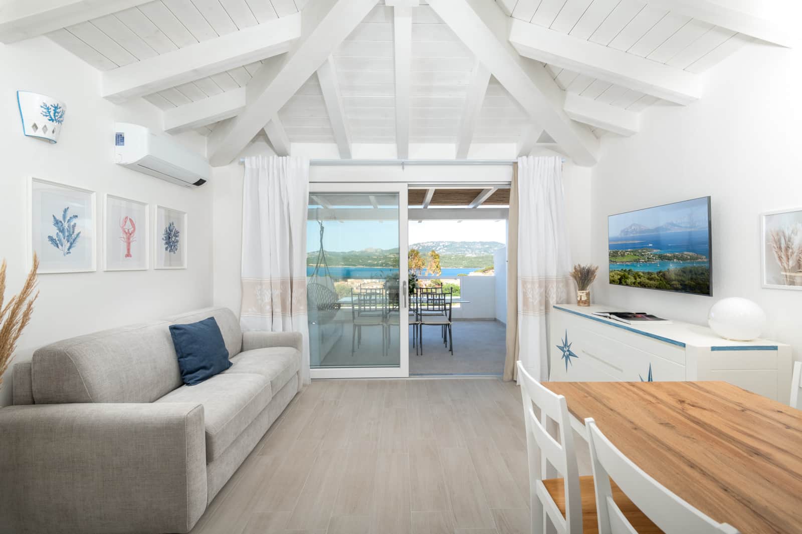 Bright living room of the Blu penthouse with sea view