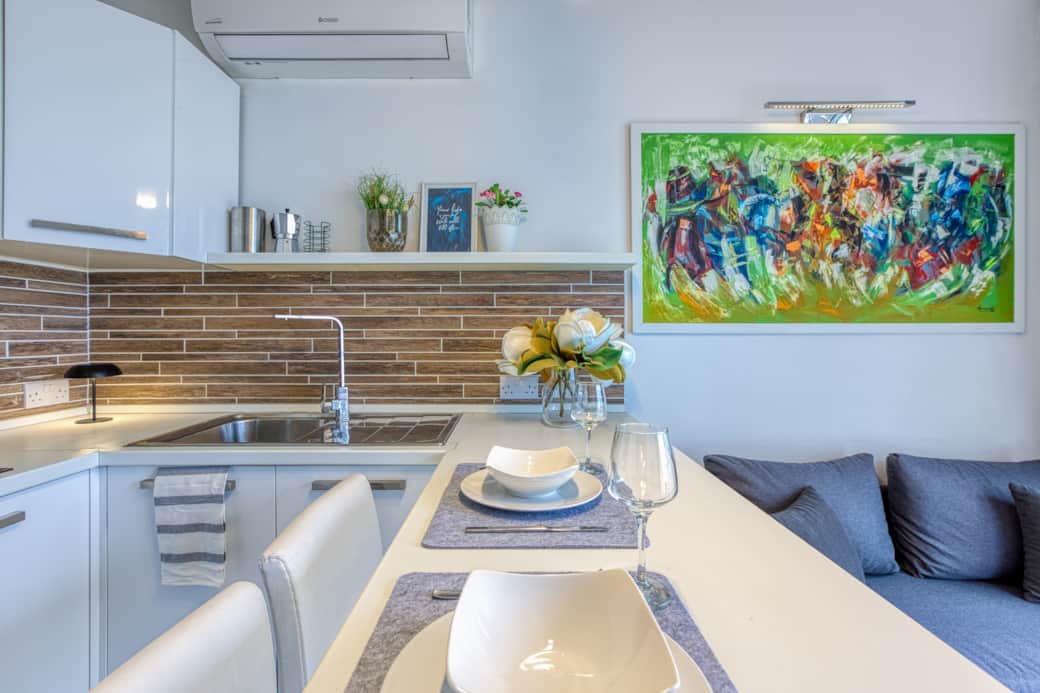 Fully equipped kitchenette and dining space