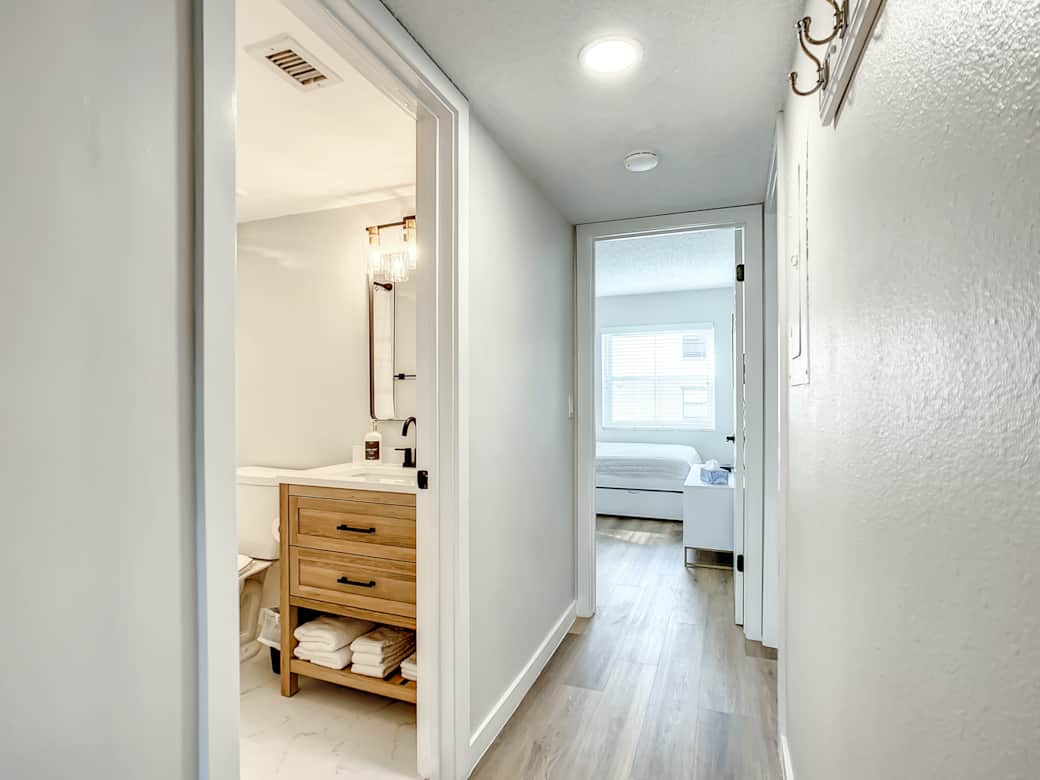 Hall bathroom featuring a relaxing soaking bathtub at Gulf Coast 107