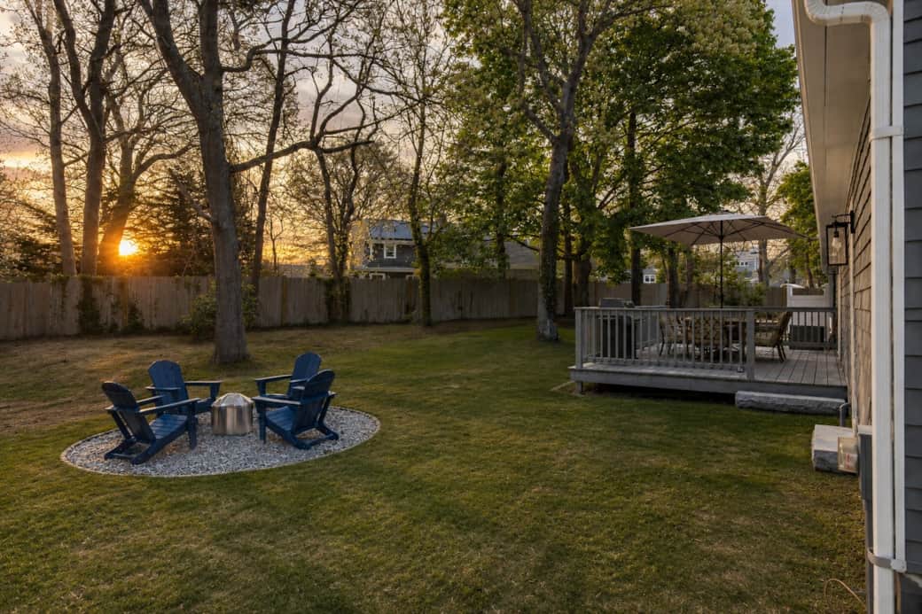 Private yard with fire pit & Adirondack chairs
