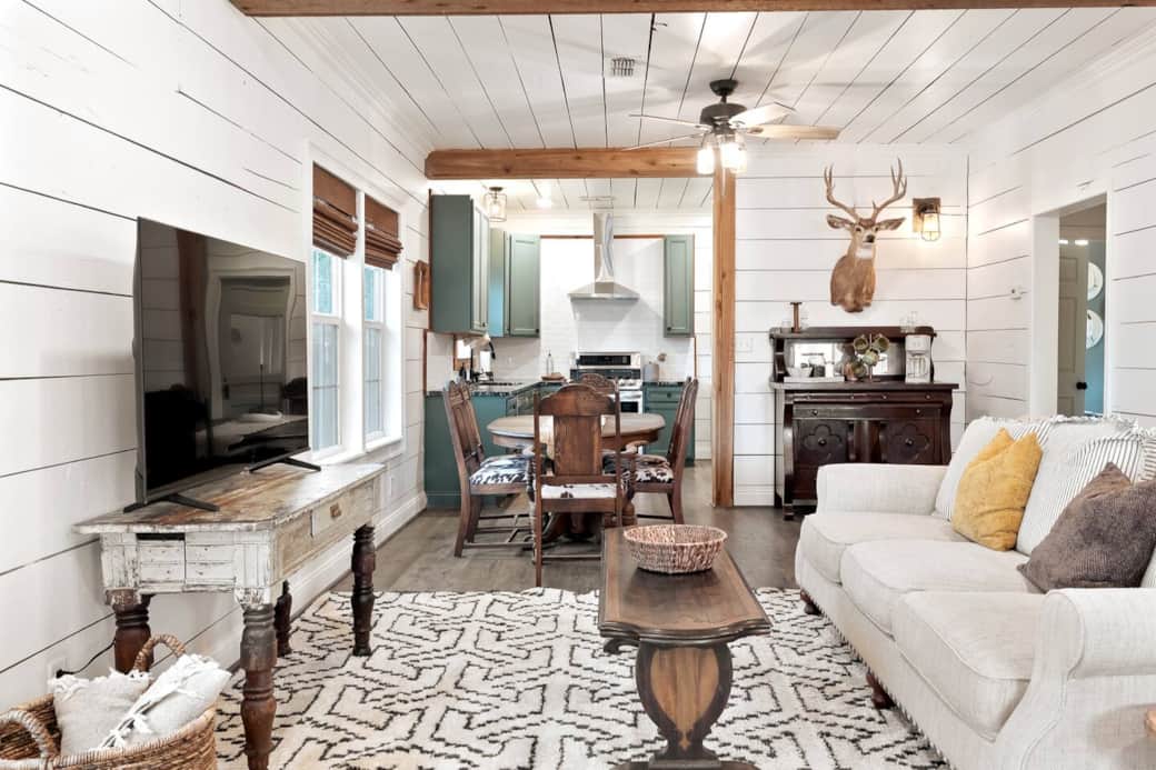 Living room, dinning room, & coffee bar.