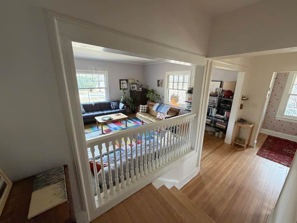 Light-filled living room with original architectural details—comfortable, open, and easy for gathering