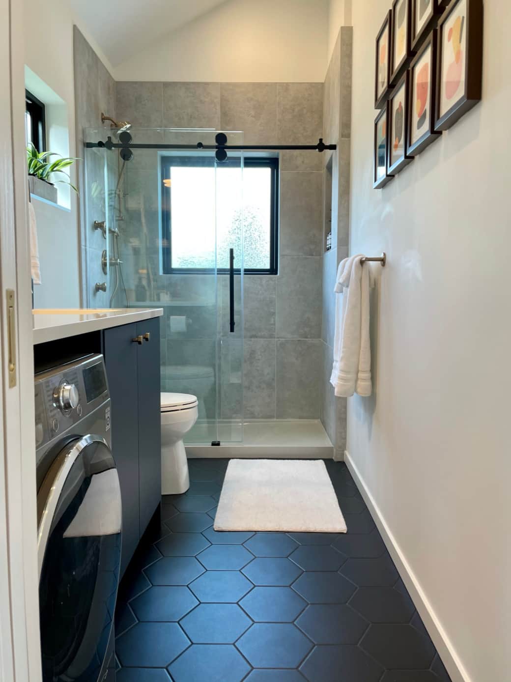 Get ready in a full bathroom with a walk-in shower and laundry readily available