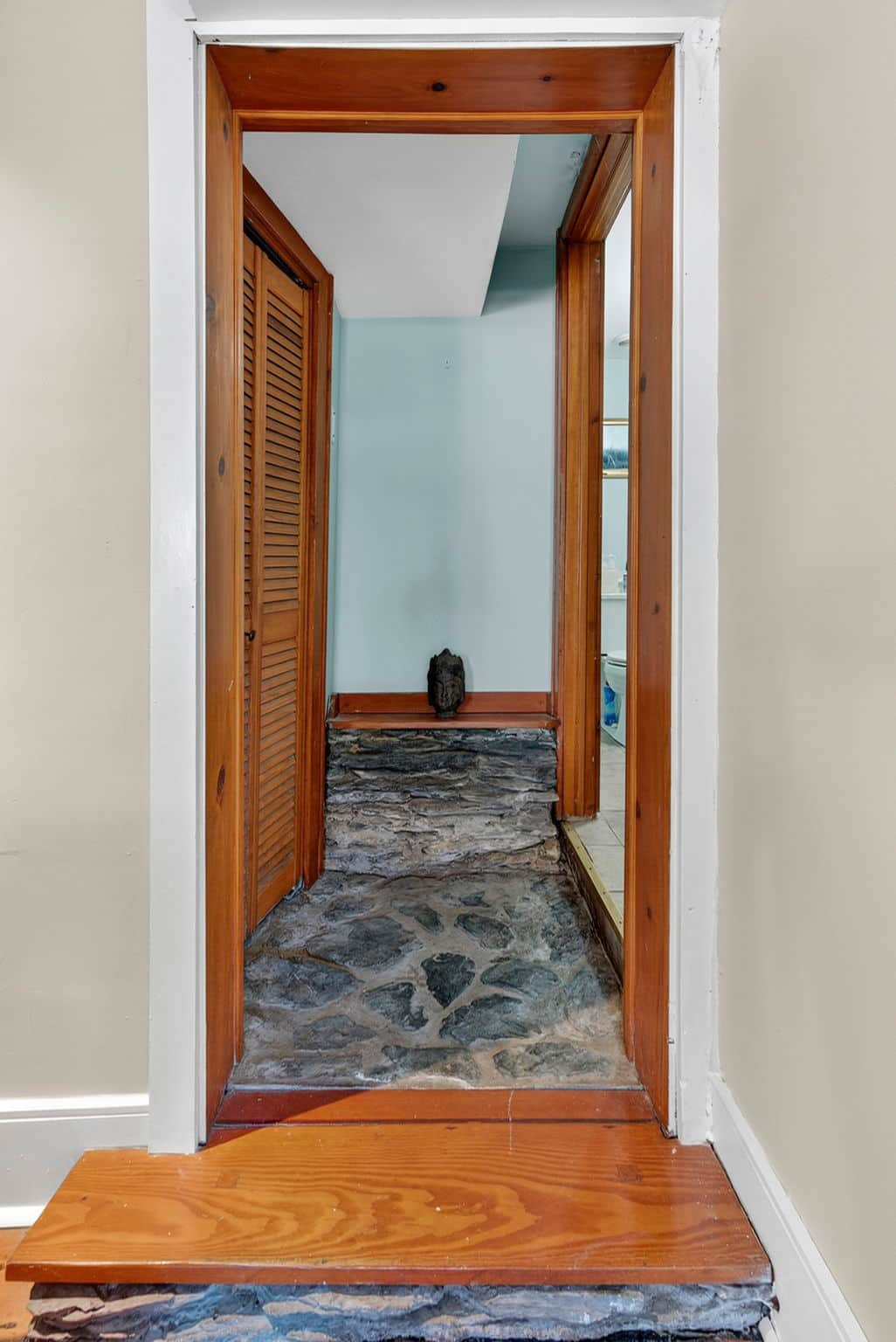 Stone entrance to downstairs bathroom