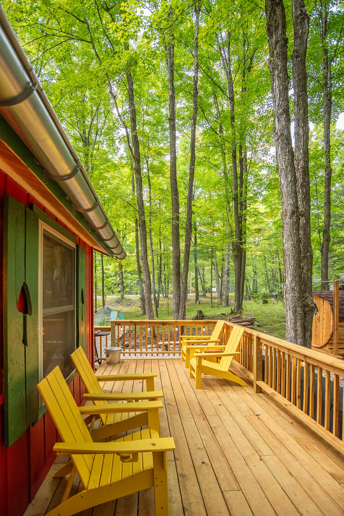 Relax in tne woods on the deck at The Toadstool Cabin