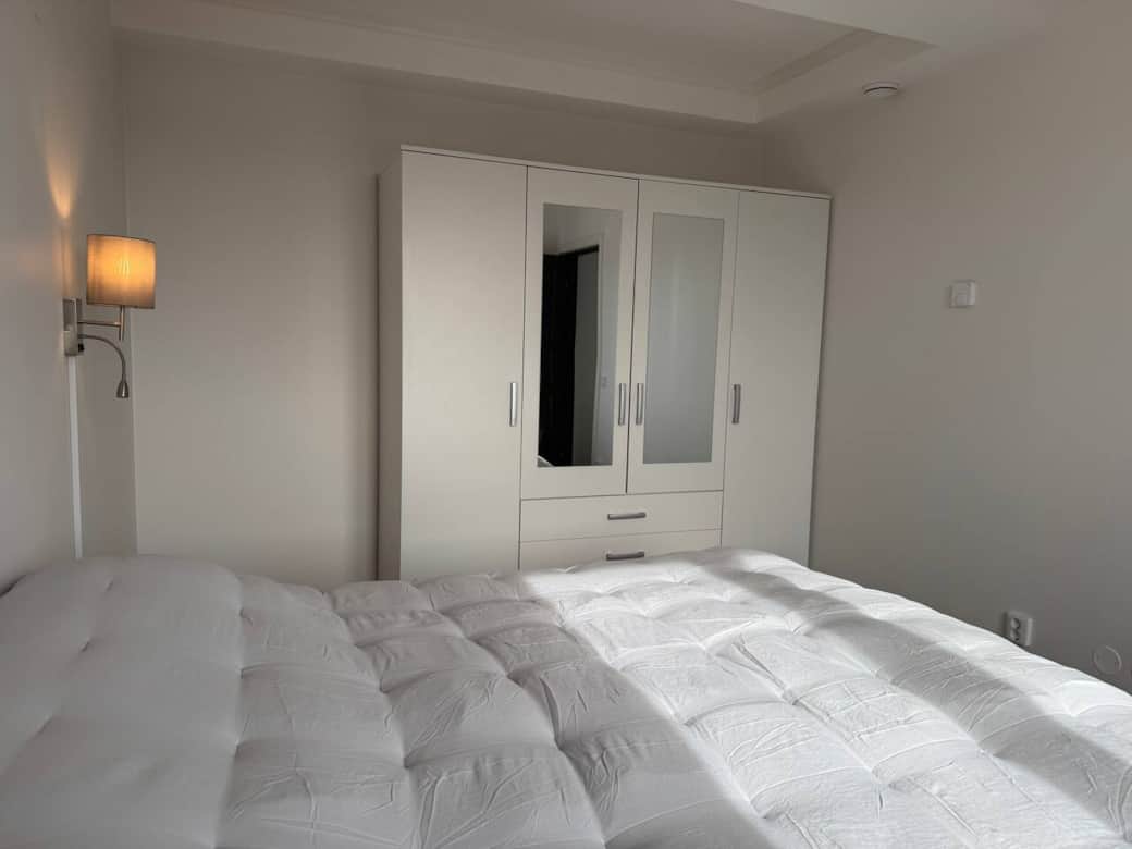 Bedroom with wardrobe and ample storage. Bedroom with wardrobe and ample storage.