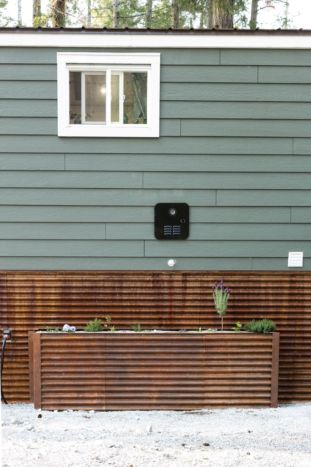 Enjoy the herb garden for your cooking at the front of the house.