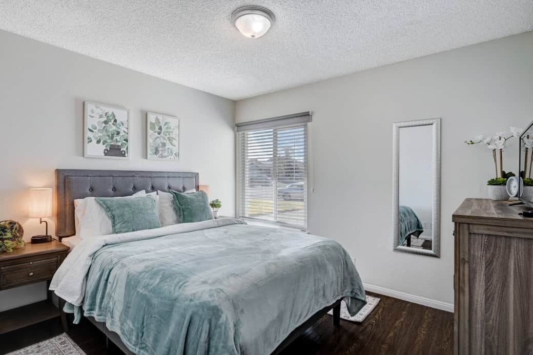 Second Bedroom with Blackout blinds, Queen Size 14 inch thick Mattress Bed, 100% Cotton Beddings and many pillows to choose from for your good night sleep and LG Smart Tv.
