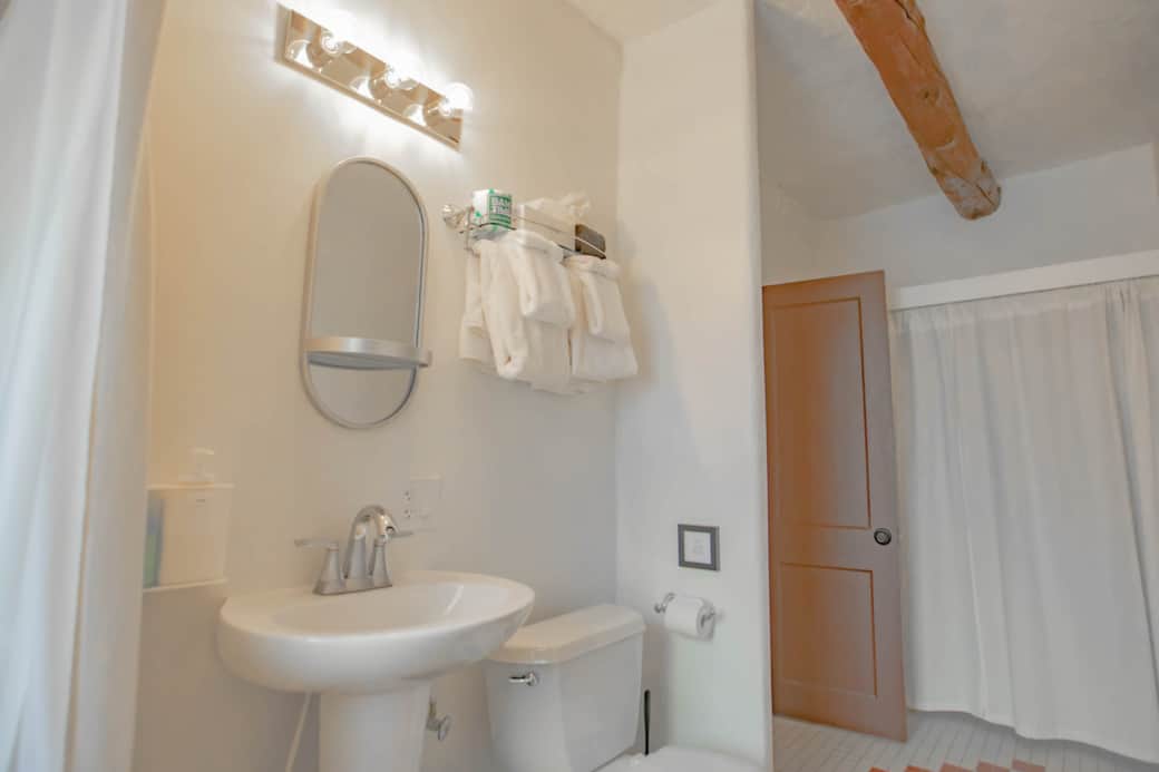 Spacious bathroom with new accessories. 