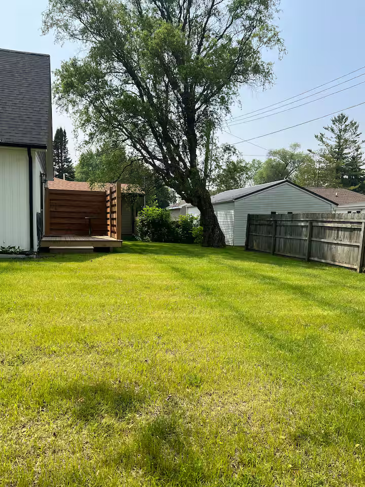 Grassy lawn with space for yard games