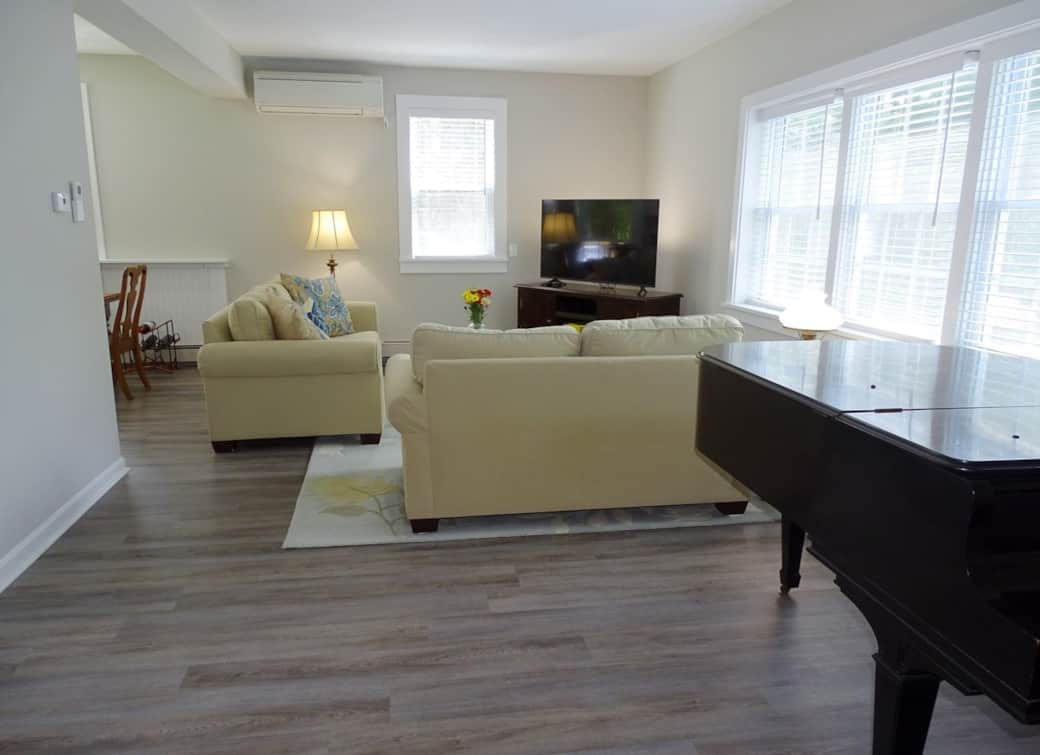 Entrance to living room with adjacent dining kitchen Entrance to living room with adjacent dining kitchen