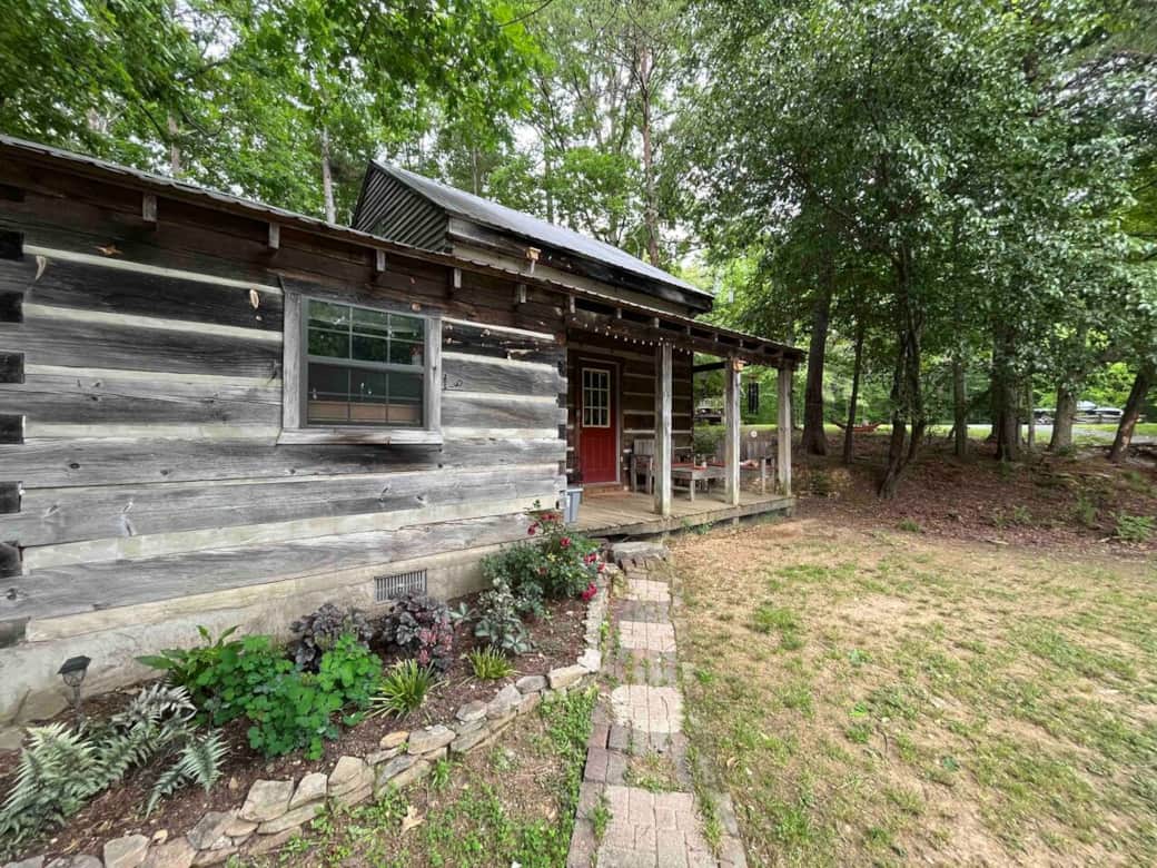 Coming up the walk to the cabin.