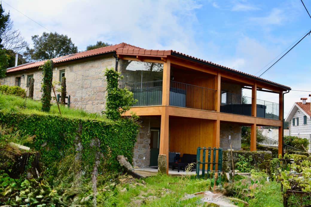 The Assento Retreat blends traditional stone architecture with expansive modern verandas.