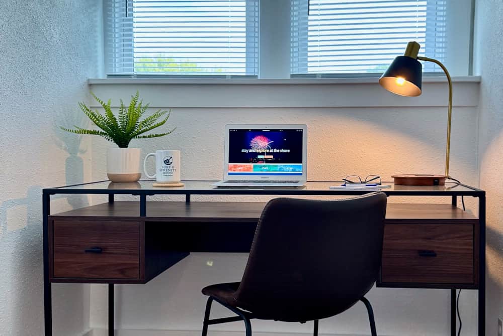 Dedicated desk workspace in the queen bedroom at Surf & Serenity House