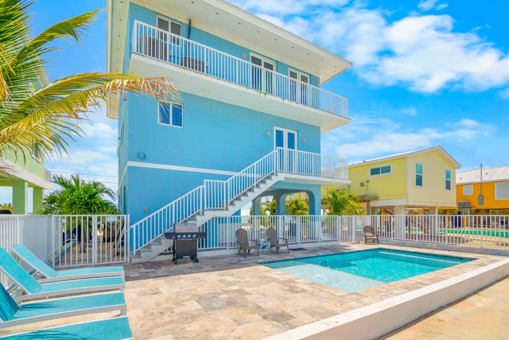 View of the pool and back of the home