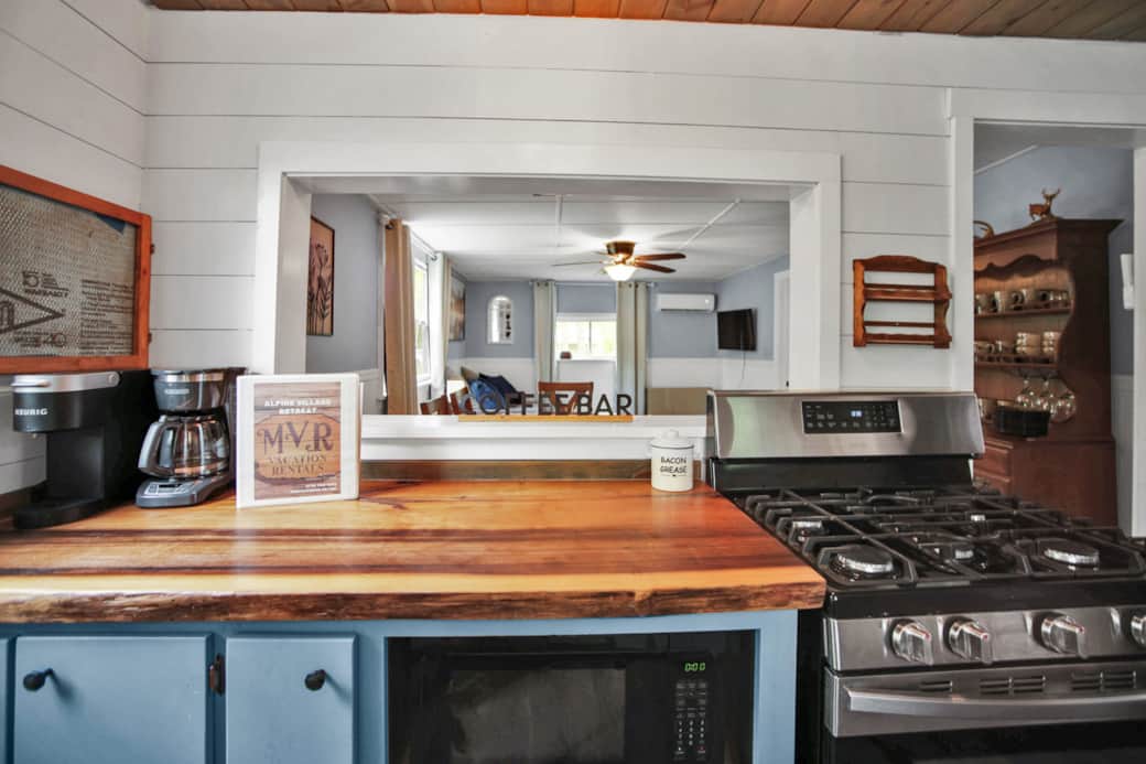 Kitchen with Keurig and coffee pot, outdoor bbq, crockpot. 