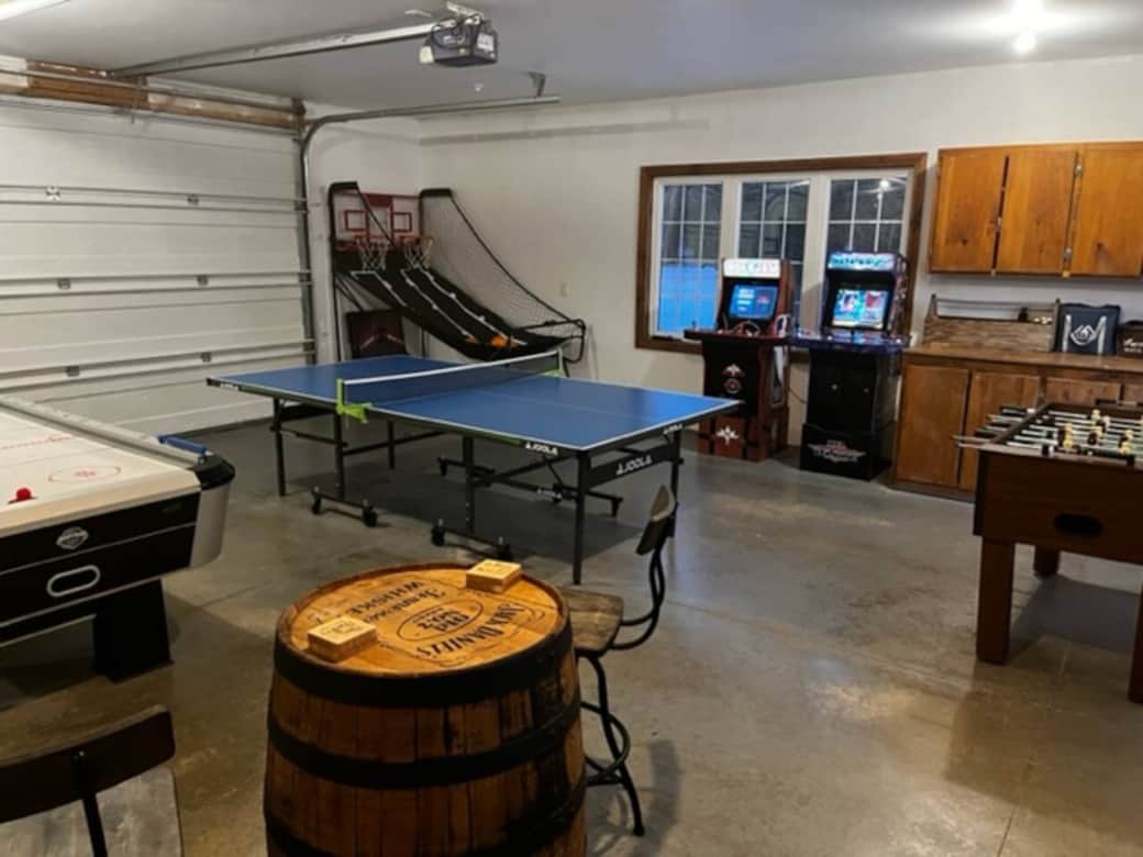Games room with pool table, air hockey, ping pong, foosball, and basketball shootout arcade games as well as NBA Jam and NFL Blitz arcade games for hours of enjoyment.