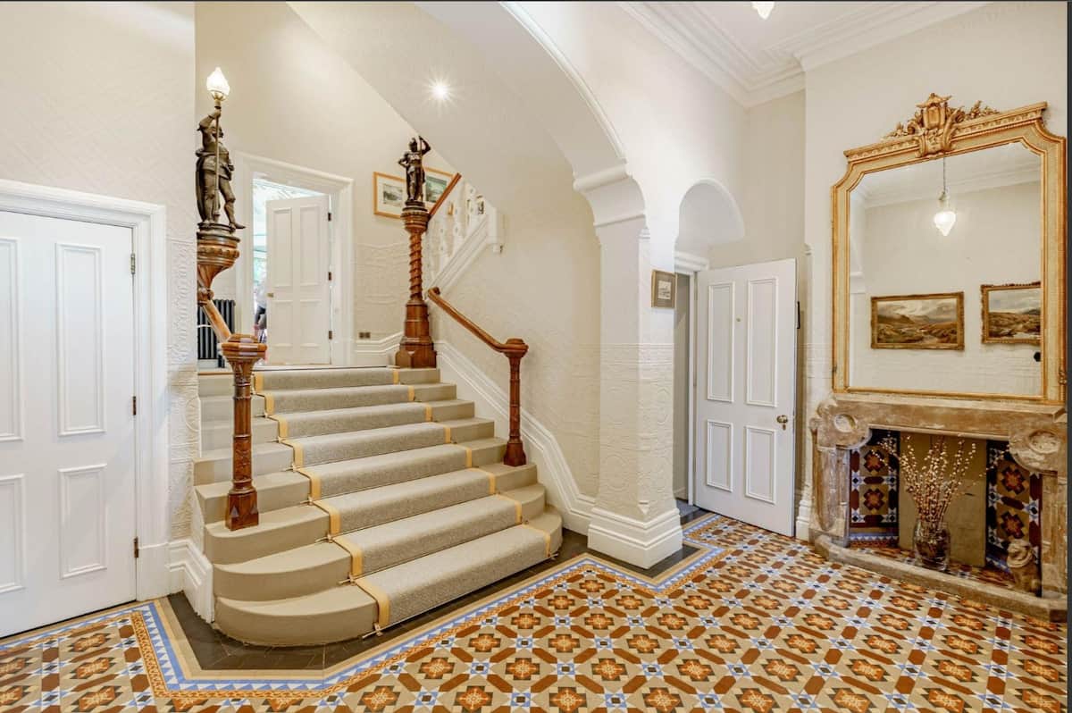 Make a memorable first impression with the property's stunning grand entrance and original period features.