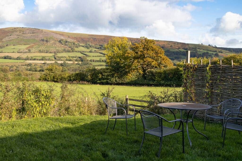 A small private garden provides a stunning outlook across the Black Mountains (a BBQ is provided) A small private garden provides a stunning outlook across the Black Mountains (a BBQ is provided)