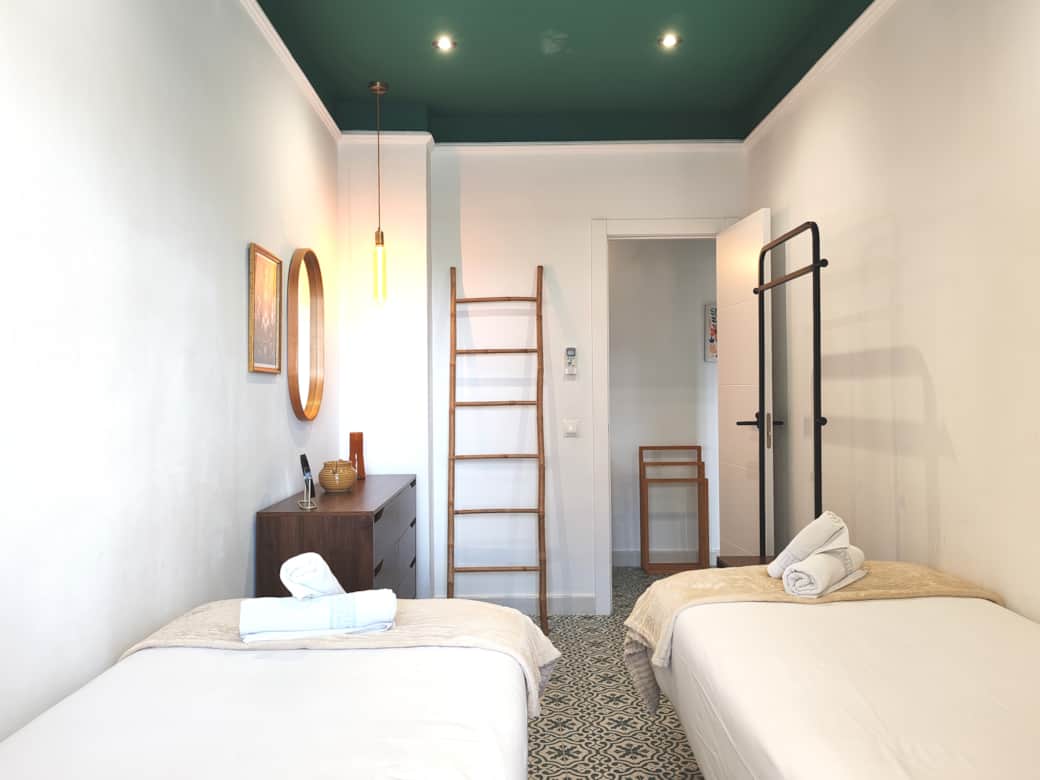 Dormitorio dos camas ciudad confort