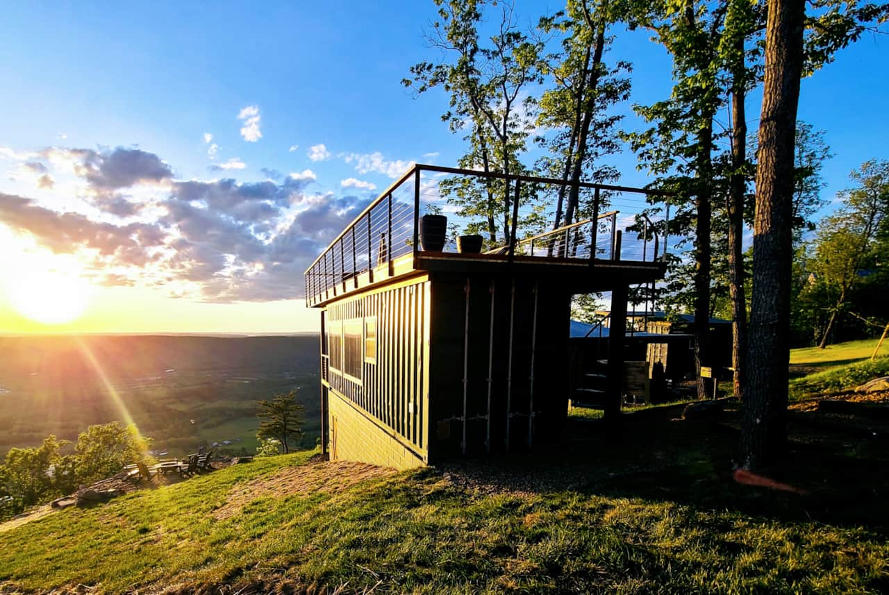 Golden hour casts a beautiful glow over Cloud 9 and the landscape beyond.
