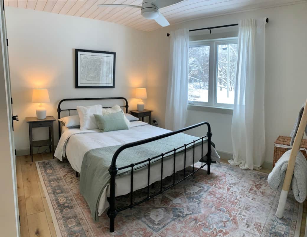 Main floor bedroom with queen bed
