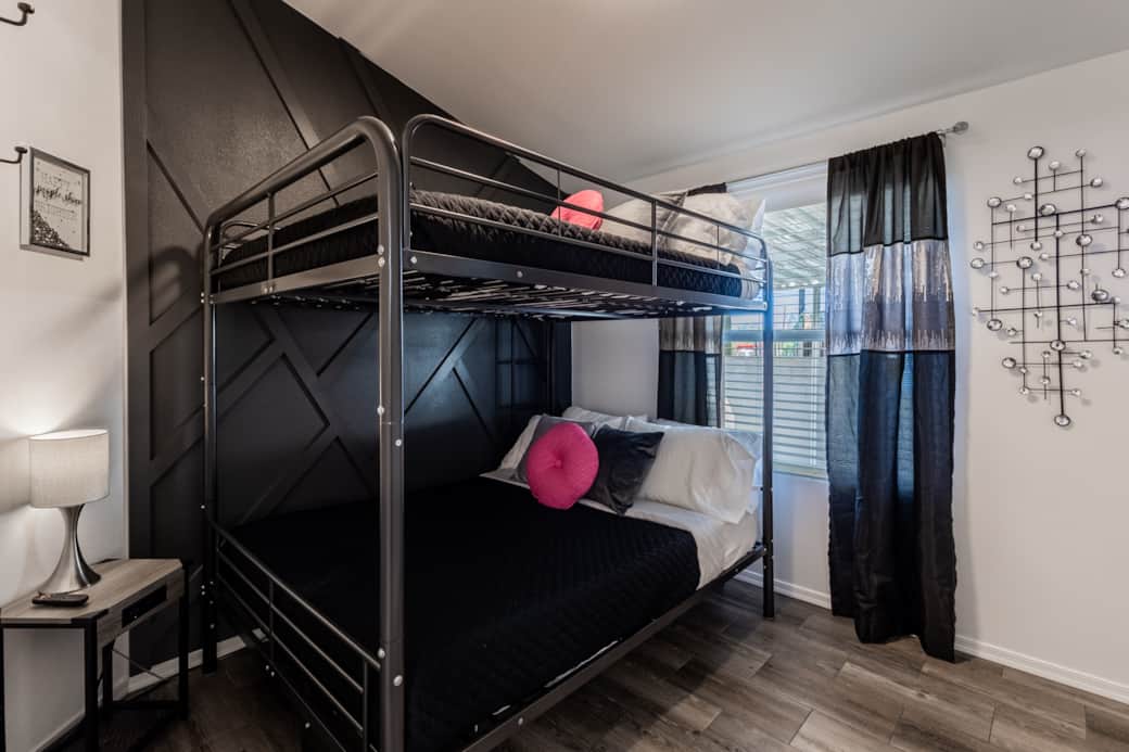 Full-size bunks, 50” Smart TV, room darkening  drapes, closet storage, touch lamp & space to relax.
