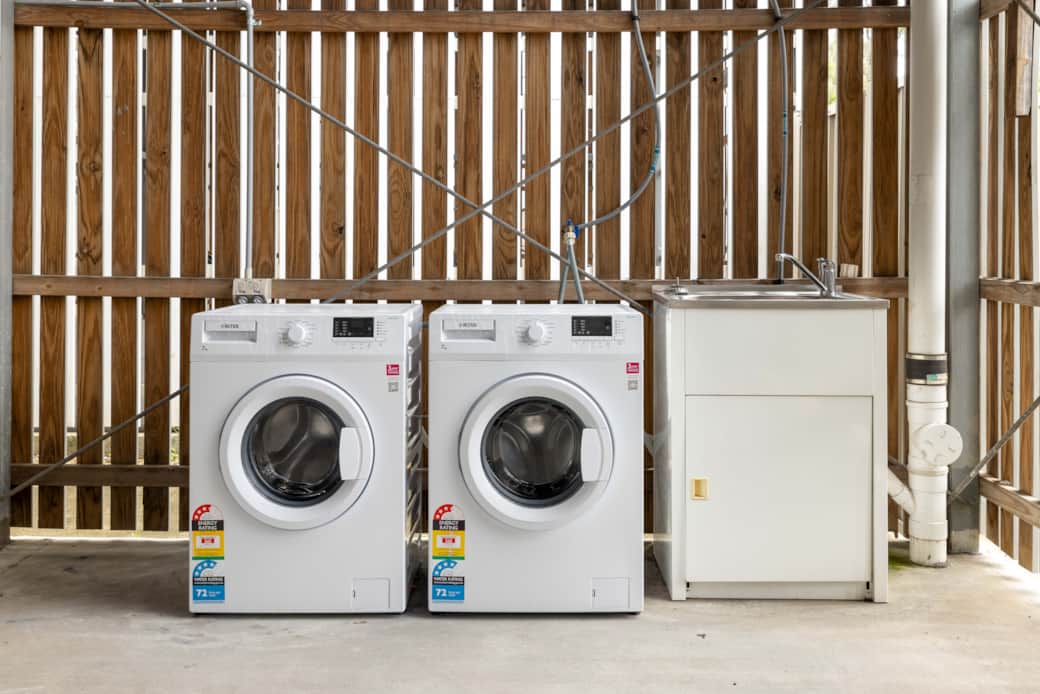 Shared Laundry Area: Washer available for convenient laundry needs 