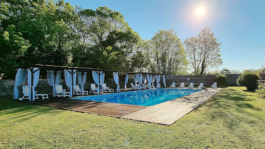 Peaceful pool area in the wooded park Peaceful pool area in the wooded park