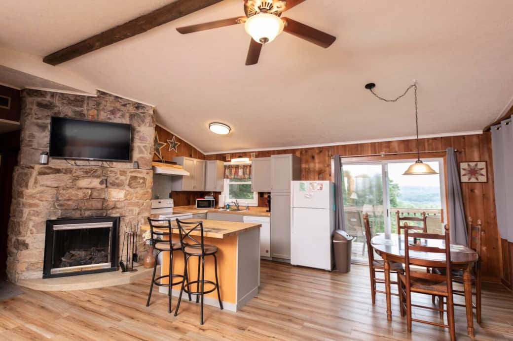 living room opens up to kitchen and dining area living room opens up to kitchen and dining area