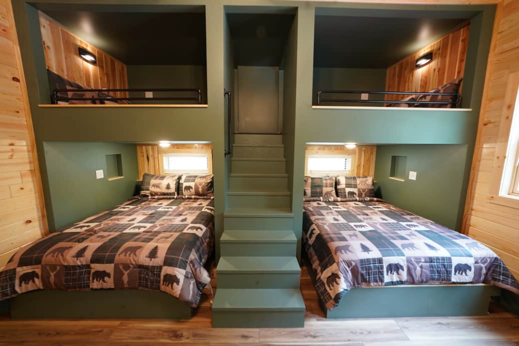 2 queens on bottom. 2 fulls on top. Bedroom in loft. 2 queens on bottom. 2 fulls on top. Bedroom in loft.