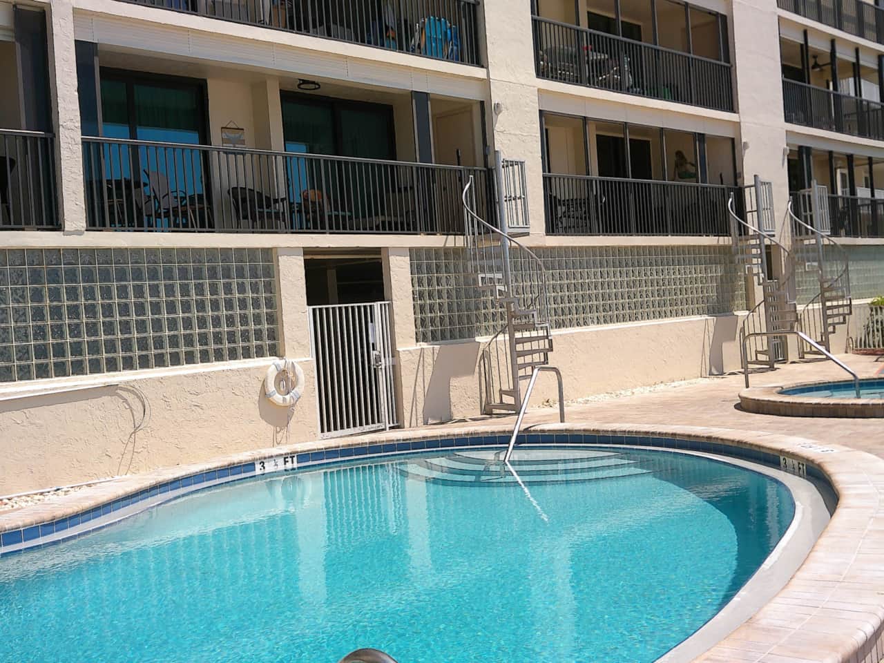 SPIRAL STAIRCASE ACCESS TO POOL AREA